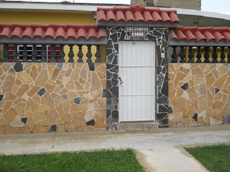 'House entrance' Casas particulares are an alternative to hotels in Cuba. Check our website cubaparticular.com often for new casas.